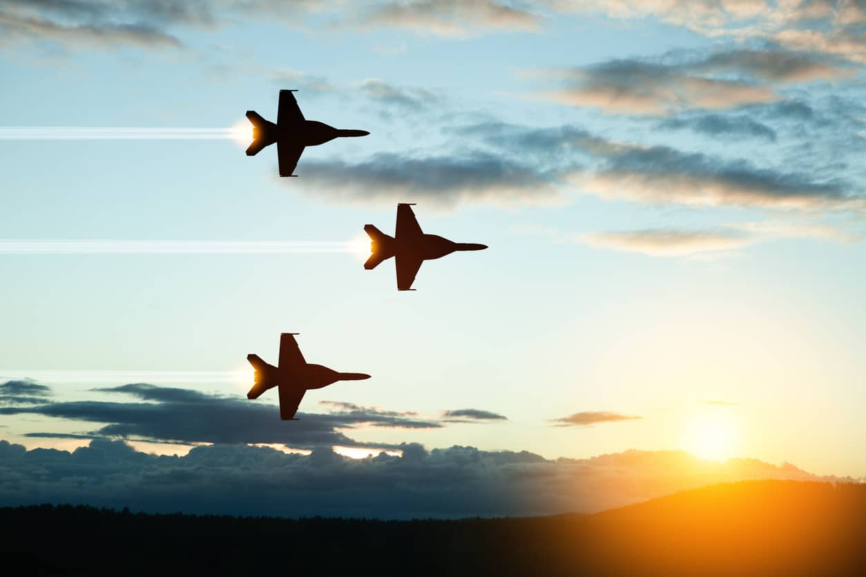 Air Force Day. Aircraft silhouettes on background of sunset.